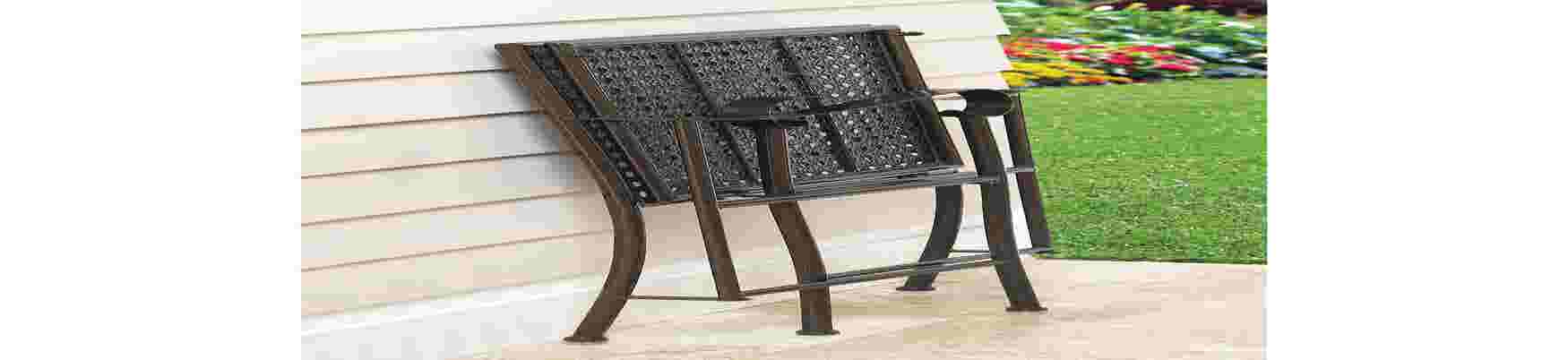 Folding chair with dark lattice back and cushion seat